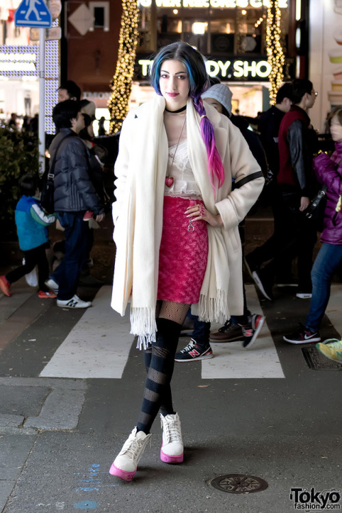 Manon on the street in Harajuku wearing a Nice Claup coat over a vintage camisole top, a handmade sk