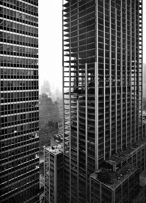 vintagemanhattanskyline:  Construction of the 45-story Sperry Rand Building at Rockefeller Center (Emery Roth & Sons, 1963) in july of 1962. View of the building under construcción from Andreas Feininger’s office at Time & Life Building, with