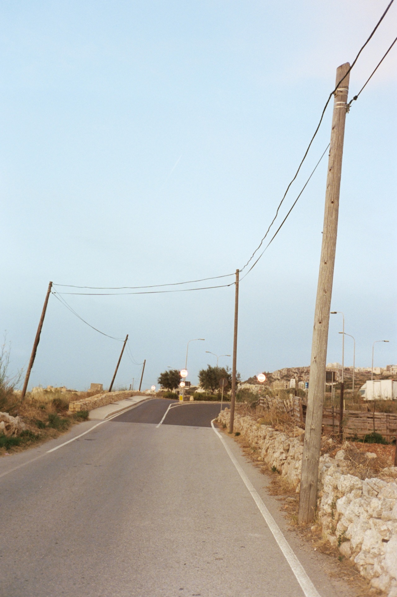 Dancing poles #empty#road #dancingpoles #malta#filmphotography #portra #kodak