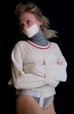 yousickfuckletmeview:  I love girls restrained in straitjackets.