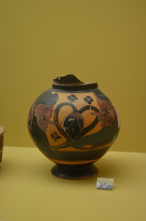 greek-museums: Archaeological Museum of the Stoa of Attalos: A shield and a plaque with a female fig