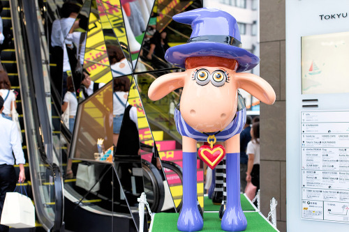 Shaun the Sheep x Hello Kitty, Sugar Sugar Rune, and Evangelion on the street in Harajuku.