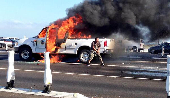 apoq:  A man stopped his car at the (SF/Oakland) Bay Bridge toll plaza, got out and