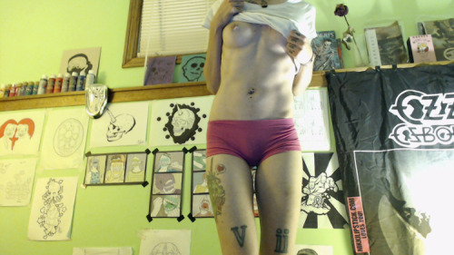 Porn Pics skullkid shows off in her room. It looks