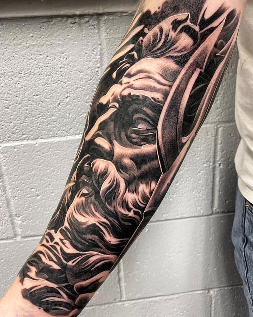 Adam Peers Tattoo Artist  Poseidon done on the forearm Start of a sleeve  Part healed part fresh Sponsored by yayofamilia  Facebook  Adam Peers  Tattoo ArtistBody ArtBody ModificationPoseidonSponsoredStartforearm healed