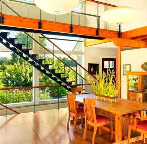 Great Room - Dining Room Example Of A Mid-sized Trendy Light Wood Floor And Brown Floor Great Room Design