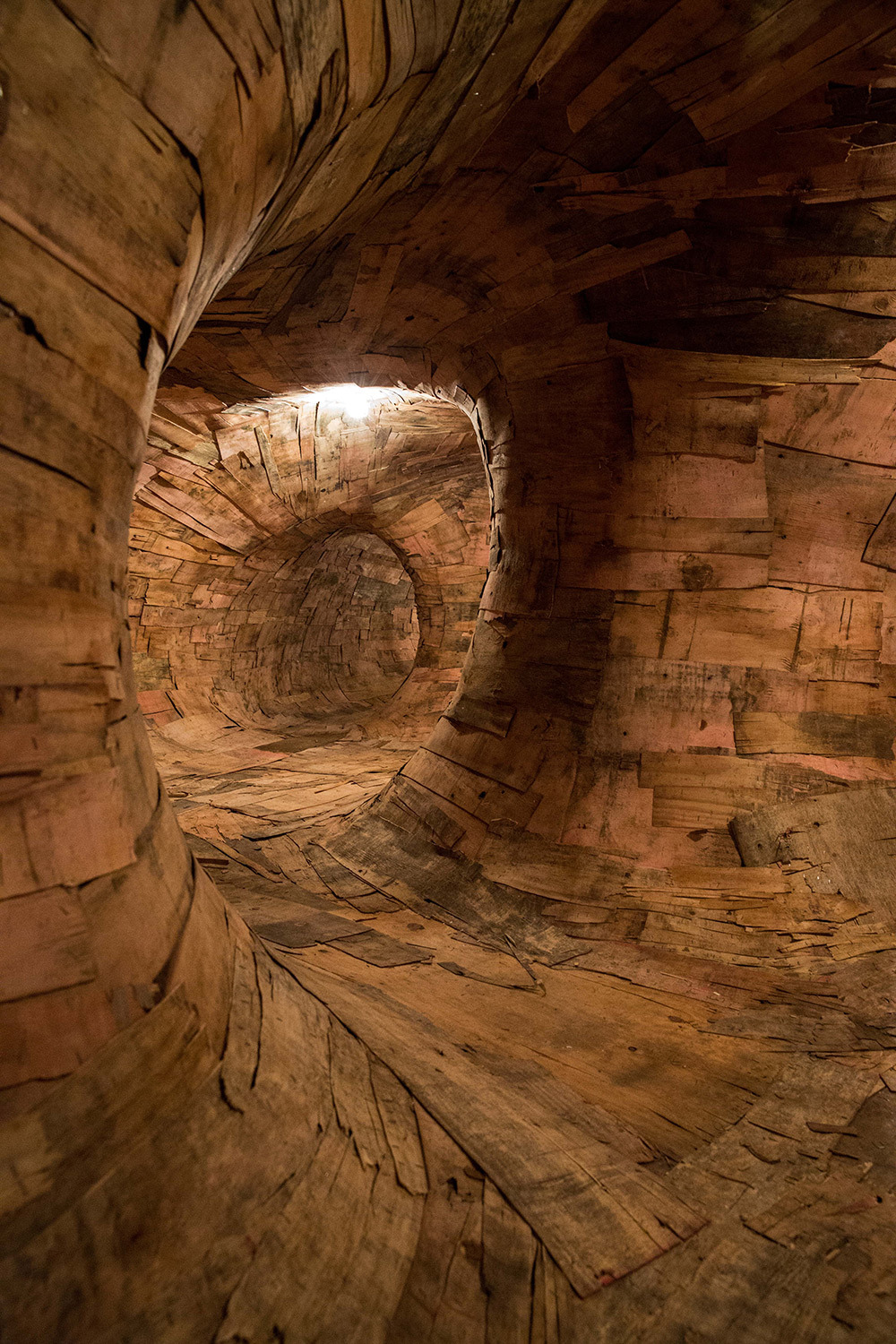 10 - Artist Henrique Oliveira Constructs a Cavernous Network of Repurposed Wood