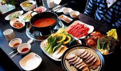 southkoreanfood:  Korean style 샤브샤브 Shabu Shabu (hot pot) @ 뽕입사랑 in Seoul, South Korea. After all of the ingredients are added, the broth is fully condensed with all of these flavors and rice is added with eggs and salted seaweed to create