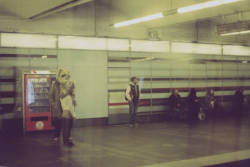 Man with a dog-head fancy dress costume on the T-bane/metro platform. 35mm colour film, Olympus OM-