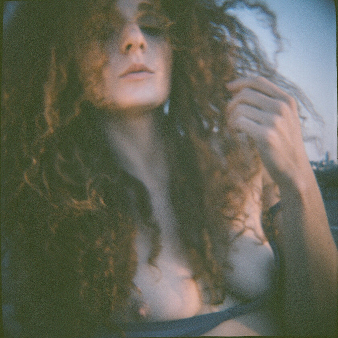davidstrangephotography:  Found an old roll of film shot with the Diana and Cat Hedlund.