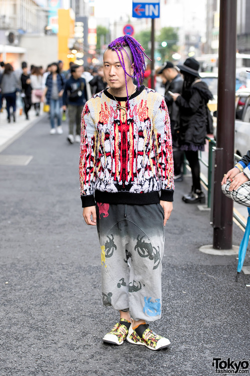 Kazuma from Uggla Japan on the street in Harajuku wearing a sweater and pants from Tom Van der Borgh