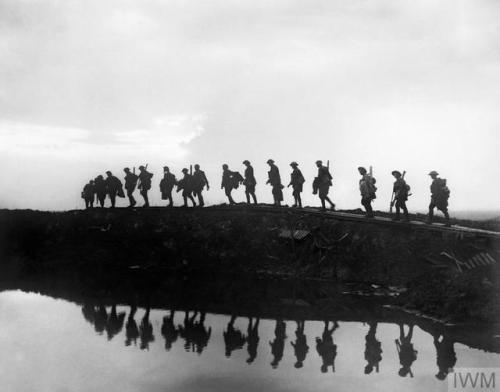 thisdayinwwi:thisdayinwwi:Oct 5 1917 1st Australian Division walking on duckboard track near Hooge. 