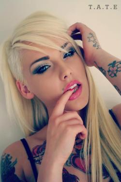 inked64:  She’s a beautiful looking inked lady.