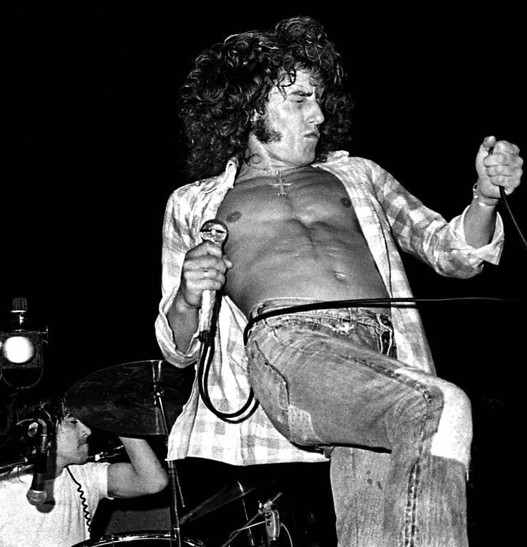 soundsof71:The Who: Roger Daltrey, with Keith Moon in the background, Miami Beach