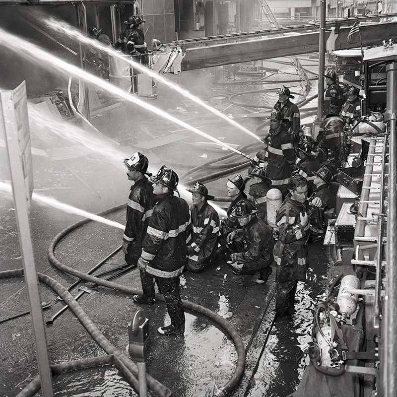 FDNY Firefighters responding to a 4-alarm fire at 7 Elliot Place, the Bronx, on July 25, 1968.