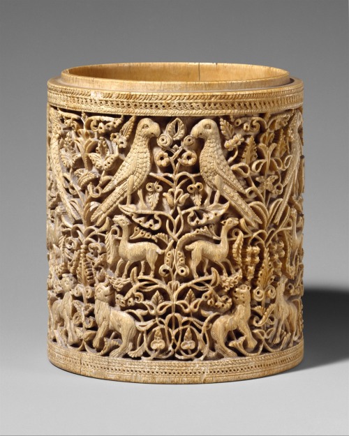 princesspeterpan:Pyxis, 10th century (950–975 CaliphalSpanish; Made in AndalusiaIvory; H. 4 5/8 in. 