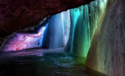 sixpenceee:Behind A Frozen WaterfallWho knew that a) you could get behind a frozen waterfall and b) they would have such magnificent colors? This is located at Minnehaha Falls in Minneapolis, Minnesota (Source)For more posts, visit sixpenceee.com.