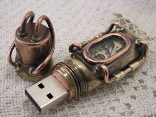 wickedclothes:   Steampunk USB Flashdrive This steampunk flash drive will hold 32 GB of data. This item lights up and is waterproof, for storage needs in any situation. Sold on Etsy.