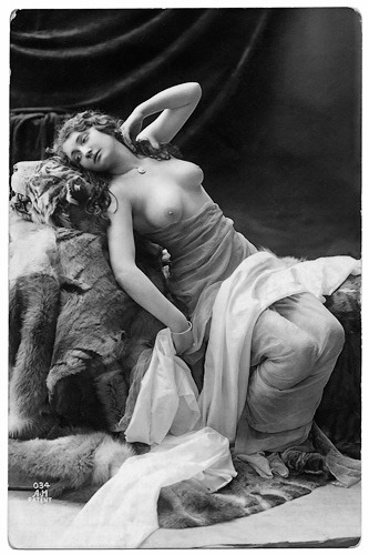 No boudoir set is complete without a woman in diaphanous draperies posing languidly