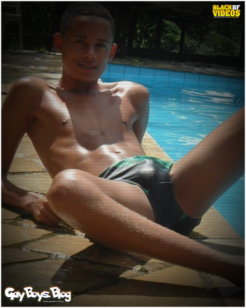 Black boy posing by the pool. GayBoysBlog HOME