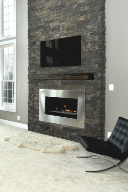 modernlife:  that fireplace and the rock