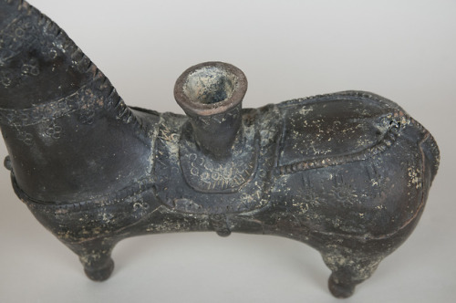 Black ceramic rhyton in the shape of a saddled horse (Amlash culture,Iran).
