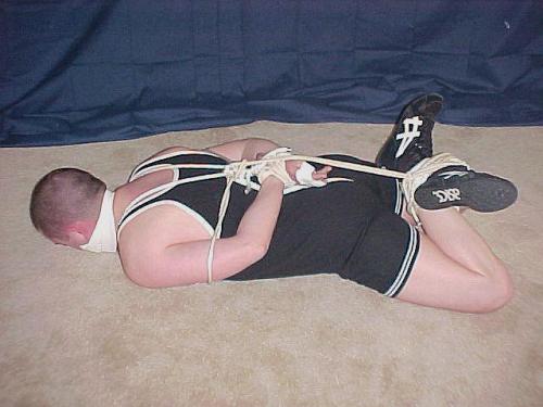 asicswrestoneweb:MORE GUYS TIED UP IN WRESTLING SHOES AND SINGLETS: