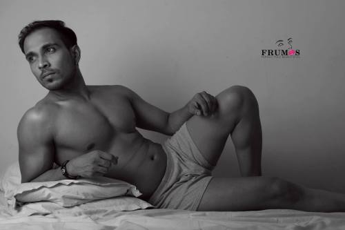 Hunk on Bed