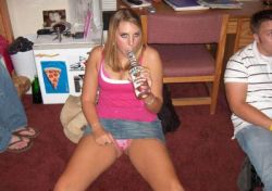hotdrunkchicks:I think this chick is so drunk she doesn’t realize the goods are hanging out.