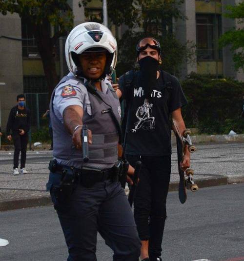 revnews:Sao Paulo, Brazil - Yesterday, photo taken just seconds before policeman shot photographer T
