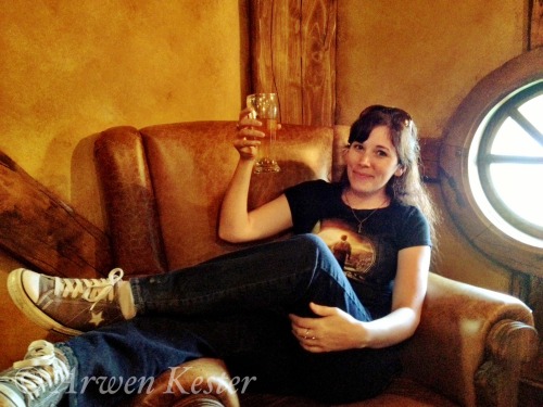 Me sitting in Bilbo Baggins’ chair and enjoying a pint of Green Dragon brew. Yes, Bilbo has hi