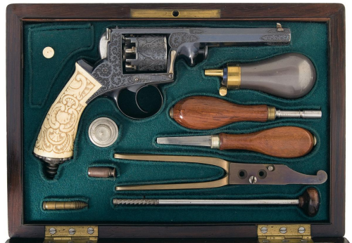 Cased and relief engraved Adams double action percussion revolver with ivory grips.  Originates from