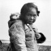 ojibwa:ojibwa:every time i remember that photo of the little inuk girl with her puppy i engage in inconsolable hystericsthis is it. this is the photo of all time