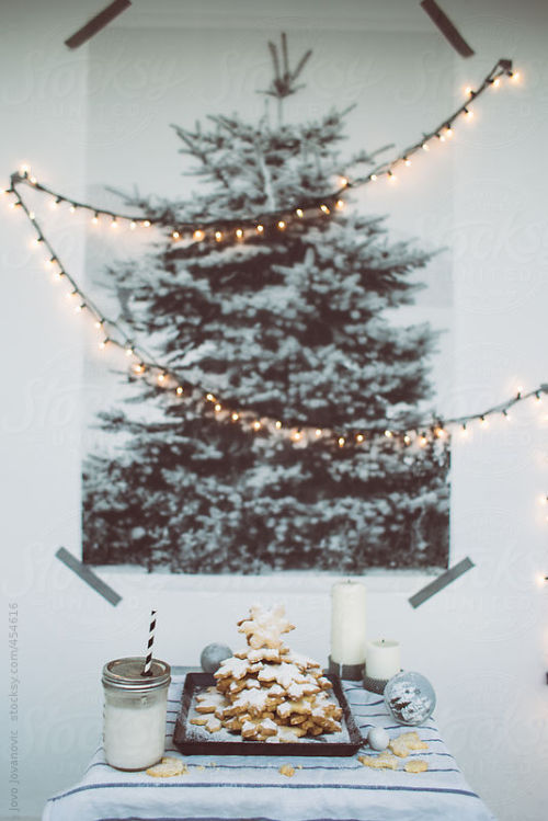 White Christmas - Christmas photo tree By JovoJVNVCAvailable to license exclusively at Stocksy