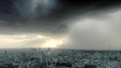 verycoolpics:  Amazing time lapse of a storm moving in over the city 