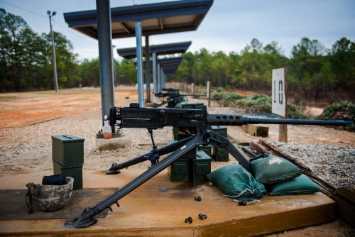 militaryarmament: Trainees firing the Browning M2 from the seated, tripod mounted position as instru