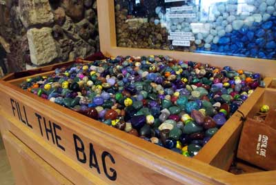 joshpeck: feraligatr:  feraligatr: oh to be a kid in front of a bin of multi coloured rocks in an obscure gift shop     F I L L T H E B A G 