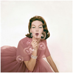 alwaysbevintage:  Model in Gown Blowing Bubbles by