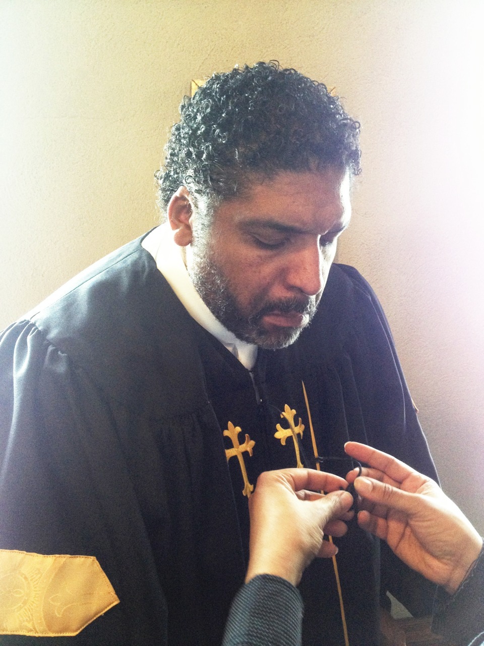 Rev William Barber getting mic-ed for his Palm Sunday sermon at Riverside Church NYC.