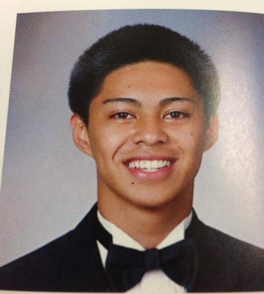 i went to justins house and he has a senior portrait this is the cutest thing ever i bet his mom made him put it up