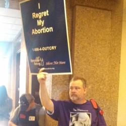 gingery-gal:  nerdy-south:  natashavc:  willyblackmore:  lauraolin:  The Texas anti-choice protest, in one photo.   Area Man Regrets Medically Impossible Procedure  He is silent no more.  I’m pretty sure his shirt says “I’m hummus.&ldquo;  Pro-hummus.