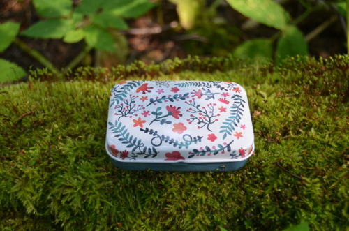 The faience succulents in the tin boxes.