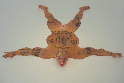 Skin rugs modeled after LA gang members by Renato Garza Cervera Click here for the story and more pi