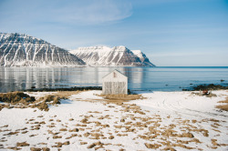 sophieseyd:  A tiny, abandoned fishing hut just outside of Isafjordur, Iceland. Isafjordur is one of Iceland’s most northern fishing villages with just over 1,000 residents and their own small airport to fly in supplies. It’s as isolated as it is