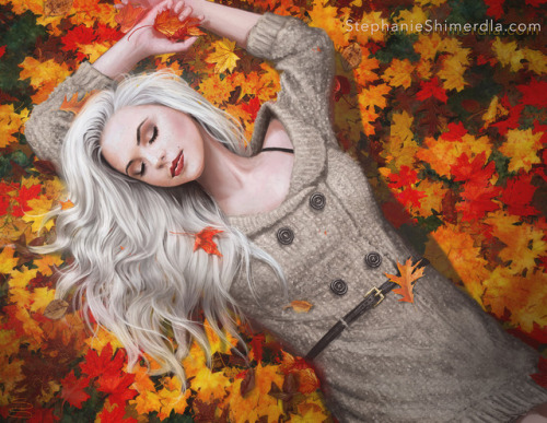 A carefree and radiant Miss September enjoys the freshly fallen leaves of autumn.Fall has always bee