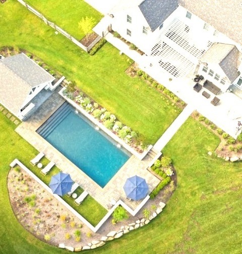Lap - PoolPool Fountain - Large Traditional Backyard Concrete Paver And Rectangular Lap Pool Fountain