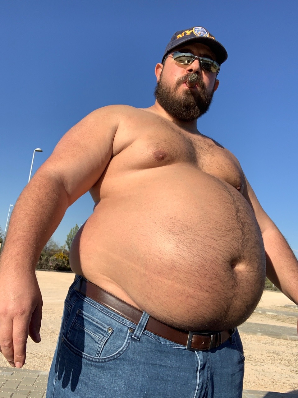 jotapei79:  Big bellied cigar bear. Watch the vids 👇https://onlyfans.com/chubbybear79