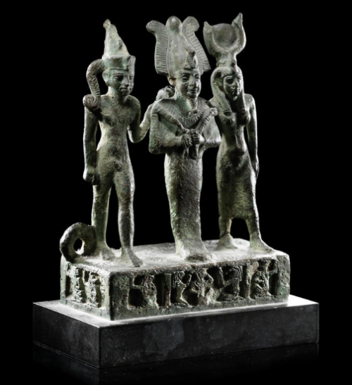 archaicwonder:Egyptian Bronze Triad (Osiris, Isis, Horus) c. Late Period,  664-30 BCThis triad repre