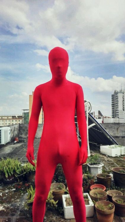 (China) Red Man on The Rooftop