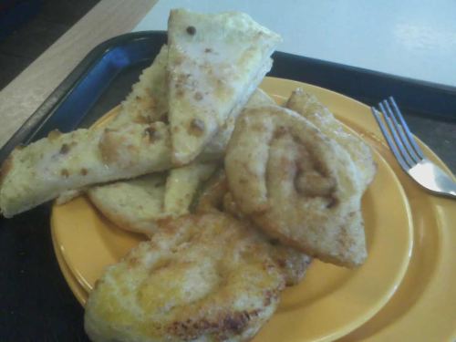 I ate 30 slices of pizza today, maybe 15 or more pieces of cheesy bread, a bowl of pasta, and five cinnamon rolls.  (There was another picture, but it got messed up somehow when I was putting it on my computer) 
